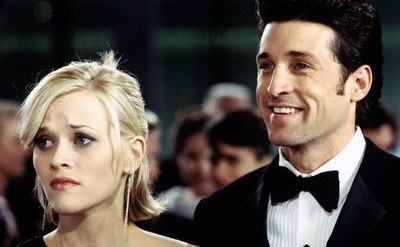 Reese Witherspoon and Patrick Dempsey dressed up for an event in the film Sweet Home Alabama